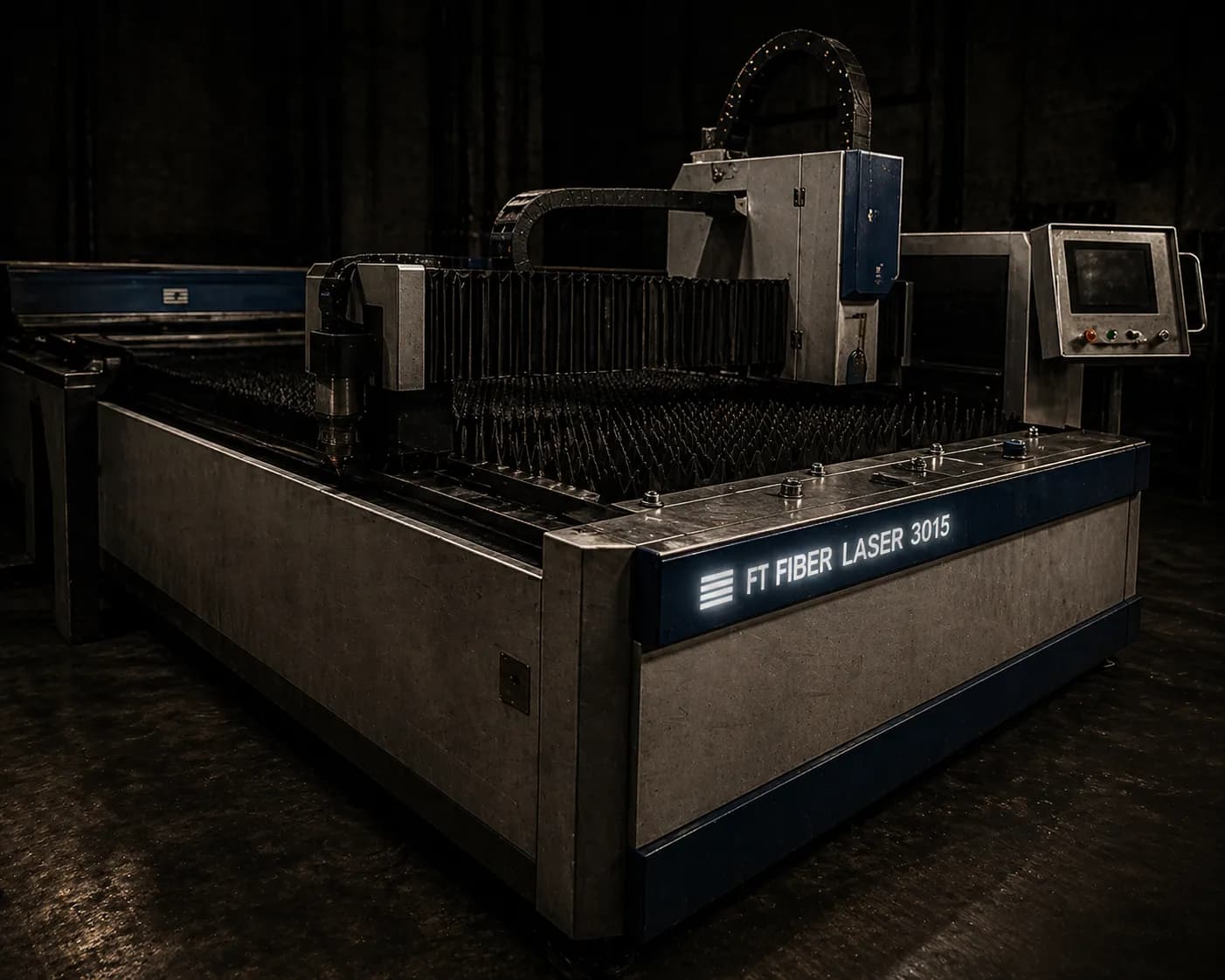 Sheet metal laser cutting operation showing focused beam cutting through mild steel sheet in industrial fabrication